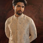 Ivory silk jacket with floral motifs in silver zari. Comes as a set with Offwhite Kurta set with all over abstract embroidery in tone on tone hues and churidar.